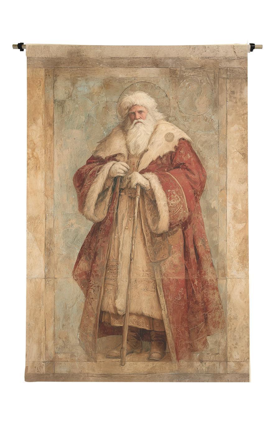 A vertical wall tapestry or scroll depicting a painted portrait of Santa Claus in a red robe with white fur trim, shown hanging against a plain white background.