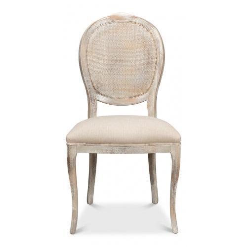 Beige chair with a rattan back on a white background