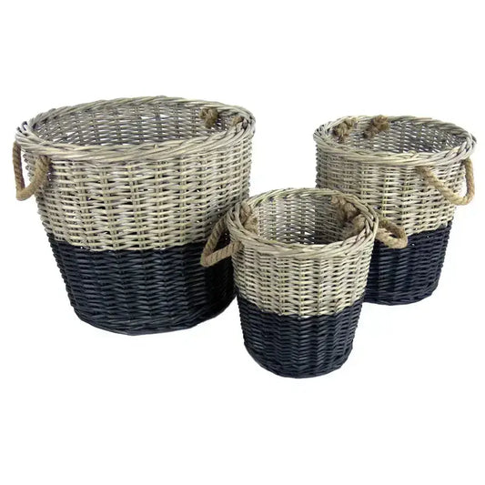 Three wicker baskets with black bottom halves on a white background