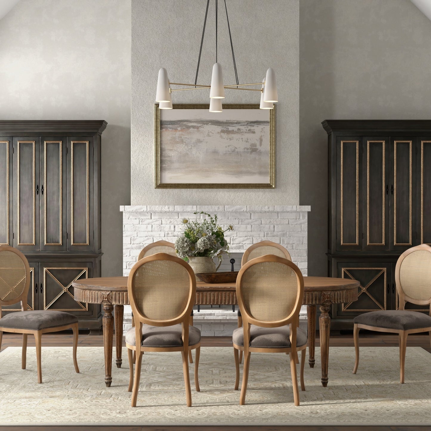 Dining room with wooden table and chairs, large windows, and a fireplace.