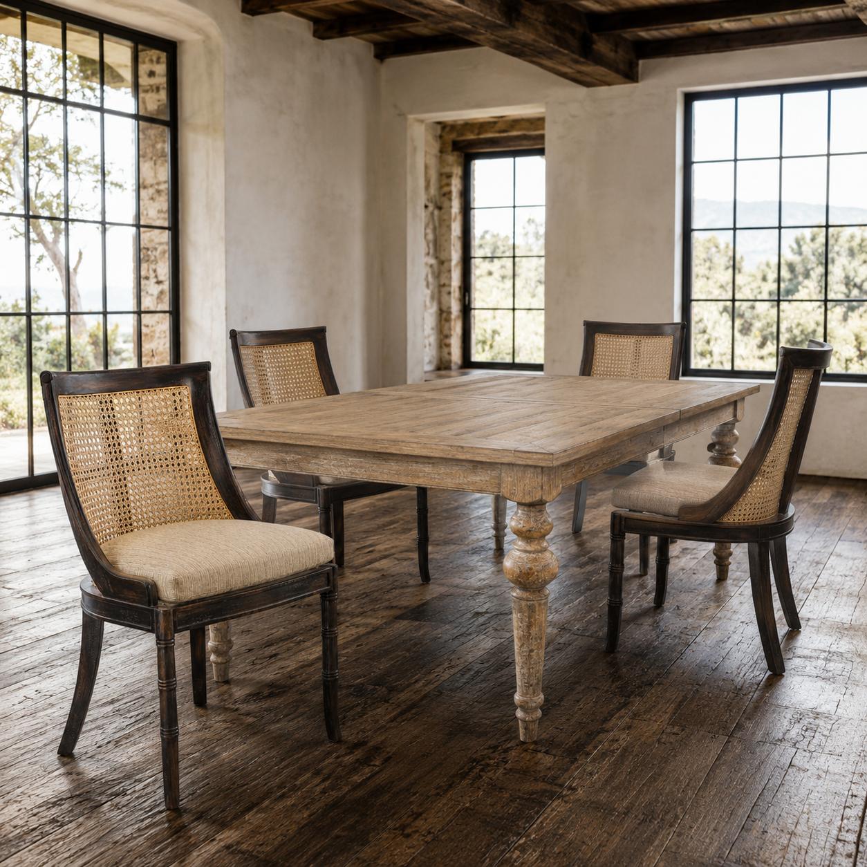 Dining room with wooden table and chairs in a rustic setting