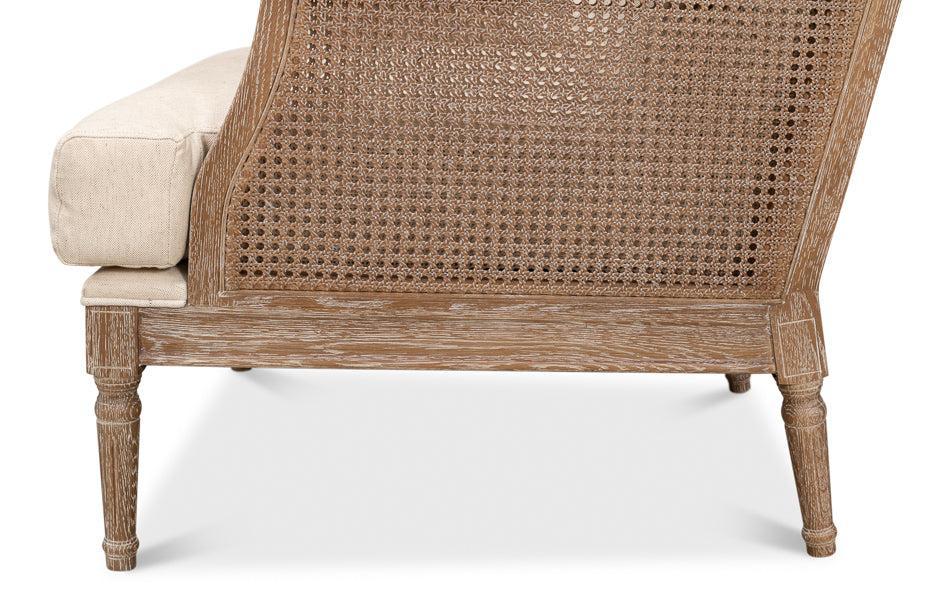 Whitewash oak cane accent chair with cream linen blend cushion and white glove delivery included
