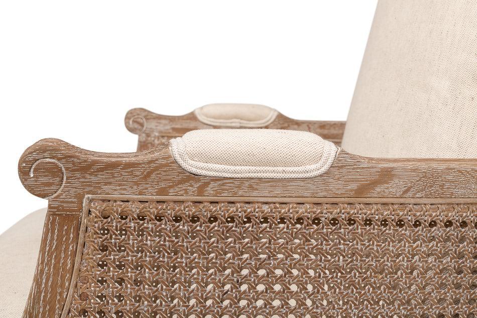Close up of arm of whitewash oak cane accent chair with cream linen blend cushion and white glove delivery included